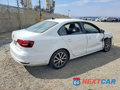 Trzecie zdjęcie samochodu z tyłu: 2016 VOLKSWAGEN JETTA SE VIN:3VWD67AJ4GM266383 - miniatura