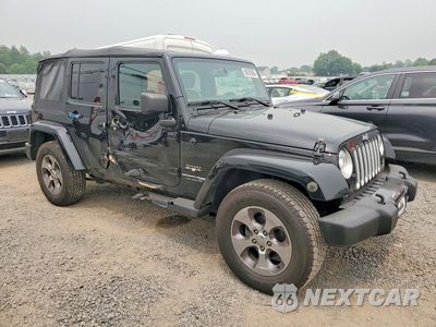 Czwarte zdjęcie samochodu z boku: 2018 JEEP WRANGLER UNLIMITED SAHARA VIN:1C4HJWEGXJL927564 - miniatura