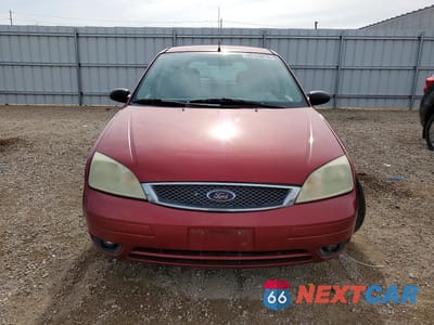 Piąte zdjęcie samochodu w środku: 2005 FORD FOCUS ZX5 VIN:3FAFP37N35R148679 - miniatura
