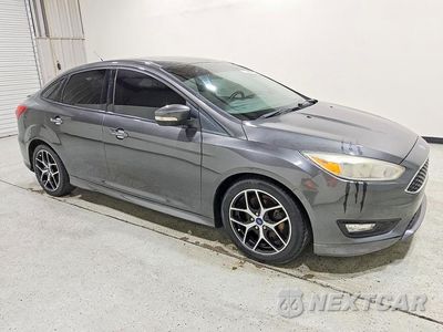 Czwarte zdjęcie samochodu z boku: 2015 FORD FOCUS SE VIN:1FADP3F20FL267238 - miniatura