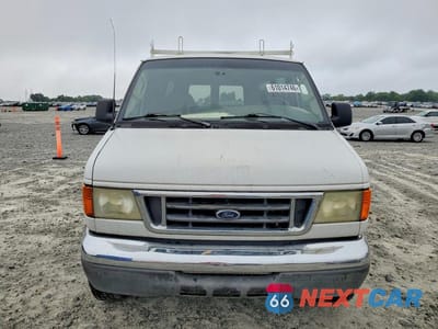 Piąte zdjęcie samochodu w środku: 2006 FORD ECONOLINE E350 SUPER DUTY WAGON VIN:1FBSS31L96HB40740 - miniatura