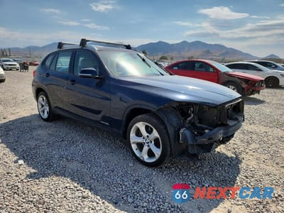 Czwarte zdjęcie samochodu z boku: 2013 BMW X1 XDRIVE35I VIN:WBAVM5C52DVV90562 - miniatura