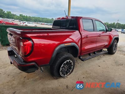 Trzecie zdjęcie samochodu z tyłu: 2026 GMC CANYON AT4 VIN:1GTP2DEKXT1170827 - miniatura