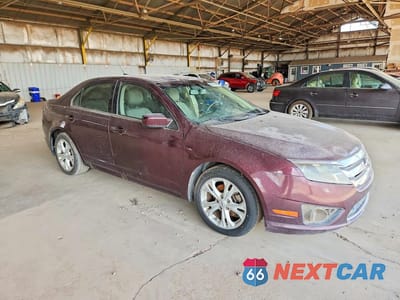 Czwarte zdjęcie samochodu z boku: 2012 FORD FUSION SE VIN:3FAHP0HA0CR449510 - miniatura
