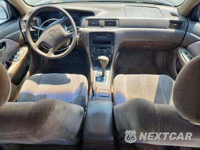 Zdjęcie 8 z 12 samochodu: 1999 TOYOTA CAMRY LE VIN:4T1BG22K9XU401415 - miniatura