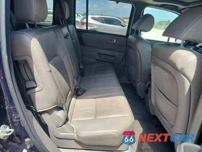 Zdjęcie 11 z 14 samochodu: 2013 HONDA PILOT TOURING VIN:5FNYF4H91DB010748 - miniatura