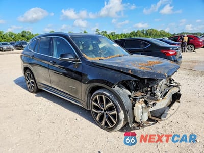 Czwarte zdjęcie samochodu z boku: 2016 BMW X1 XDRIVE28I VIN:WBXHT3C34G5E55714 - miniatura