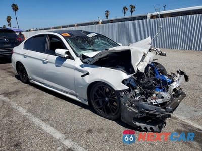 Czwarte zdjęcie samochodu z boku: 2018 BMW M5 VIN:WBSJF0C53JB283924 - miniatura