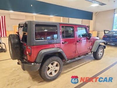 Trzecie zdjęcie samochodu z tyłu: 2011 JEEP WRANGLER UNLIMITED SPORT VIN:1J4BA3H1XBL552220 - miniatura