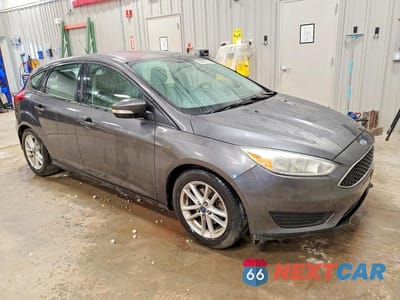 Czwarte zdjęcie samochodu z boku: 2016 FORD FOCUS VIN:1FADP3K20GL363426 - miniatura