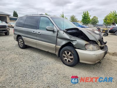 Czwarte zdjęcie samochodu z boku: 2005 KIA SEDONA LX VIN:KNDUP131656641956 - miniatura