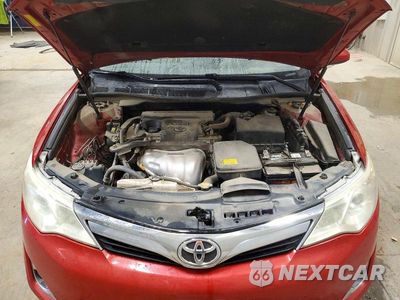 Zdjęcie 11 z 12 samochodu: 2014 TOYOTA CAMRY XLE VIN:4T4BF1FKXER385526 - miniatura