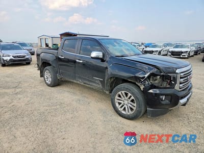 Czwarte zdjęcie samochodu z boku: 2017 GMC CANYON SLT VIN:1GTG6DEN0H1157591 - miniatura