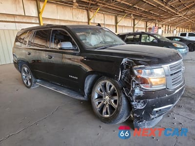 Czwarte zdjęcie samochodu z boku: 2015 CHEVROLET TAHOE C1500 LTZ VIN:1GNSCCKC9FR681411 - miniatura