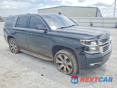 Czwarte zdjęcie samochodu z boku: 2015 CHEVROLET TAHOE C1500 LTZ VIN:1GNSCCKC7FR561557 - miniatura