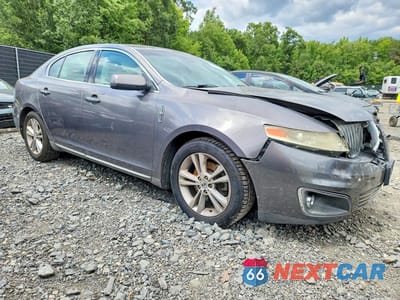 Czwarte zdjęcie samochodu z boku: 2011 LINCOLN MKS VIN:1LNHL9DR3BG607748 - miniatura