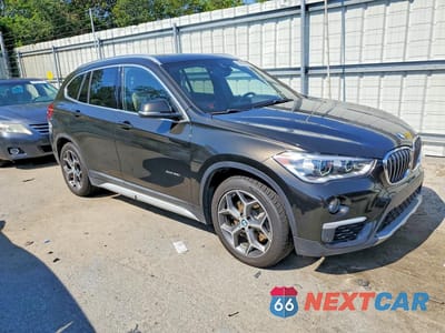 Czwarte zdjęcie samochodu z boku: 2016 BMW X1 XDRIVE28I VIN:WBXHT3C38G5E51262 - miniatura
