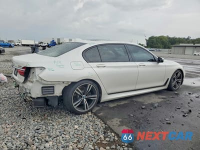 Trzecie zdjęcie samochodu z tyłu: 2019 BMW 740 I VIN:WBA7E2C55KB218281 - miniatura