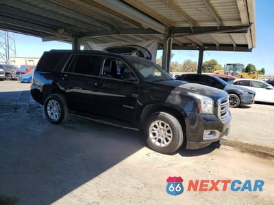 Czwarte zdjęcie samochodu z boku: 2019 GMC YUKON SLT VIN:1GKS2BKC8KR164041 - miniatura