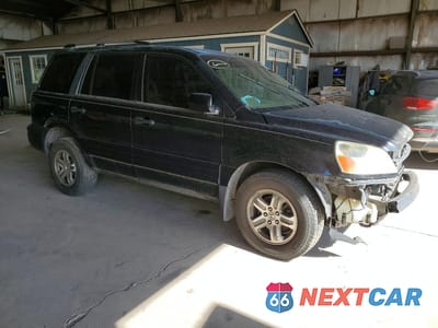 Czwarte zdjęcie samochodu z boku: 2004 HONDA PILOT EXL VIN:5FNYF18524B006333 - miniatura