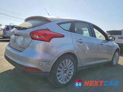 Trzecie zdjęcie samochodu z tyłu: 2016 FORD FOCUS BEV VIN:1FADP3R45GL380018 - miniatura