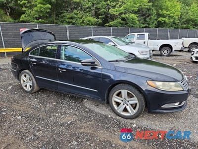 Czwarte zdjęcie samochodu z boku: 2014 VOLKSWAGEN CC SPORT VIN:WVWBP7AN2EE503093 - miniatura