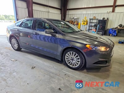 Czwarte zdjęcie samochodu z boku: 2016 FORD FUSION SE HYBRID VIN:3FA6P0LU3GR147255 - miniatura