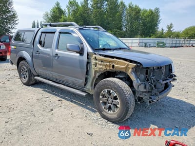 Czwarte zdjęcie samochodu z boku: 2018 NISSAN FRONTIER PRO-4X VIN:1N6AD0EVXJN729394 - miniatura
