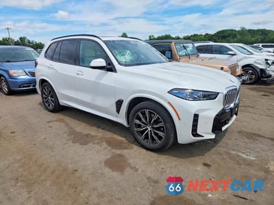 Czwarte zdjęcie samochodu z boku: 2026 BMW X5 XDRIVE40I VIN:5UX23EU01T9090393 - miniatura