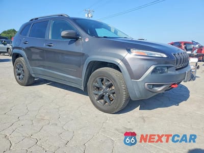 Czwarte zdjęcie samochodu z boku: 2015 JEEP CHEROKEE TRAILHAWK VIN:1C4PJMBSXFW626744 - miniatura