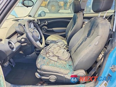 Zdjęcie 7 z 13 samochodu: 2010 MINI COOPER VIN:WMWMF3C51ATZ22704 - miniatura