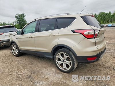 Drugie zdjęcie samochodu z przodu: 2017 FORD ESCAPE TITANIUM VIN:1FMCU0J90HUB86055 - miniatura