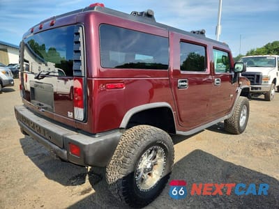 Trzecie zdjęcie samochodu z tyłu: 2006 HUMMER H2 VIN:5GRGN23U66H100235 - miniatura