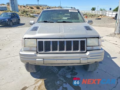 Piąte zdjęcie samochodu w środku: 1998 JEEP GRAND CHEROKEE LIMITED 5.9L VIN:1J4GZ88Z3WC162700 - miniatura