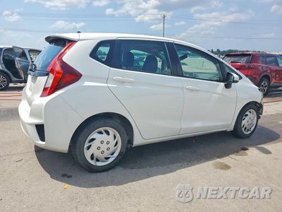 Trzecie zdjęcie samochodu z tyłu: 2015 HONDA FIT LX VIN:3HGGK5H53FM770853 - miniatura