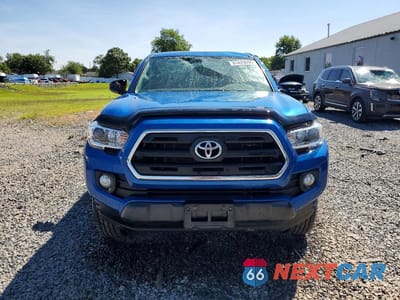 Piąte zdjęcie samochodu w środku: 2017 TOYOTA TACOMA SR5 V6 VIN:3TMDZ5BN3HM035055 - miniatura