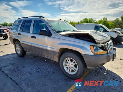 Czwarte zdjęcie samochodu z boku: 2003 JEEP GRAND CHEROKEE LAREDO VIN:1J4GW48S03C536020 - miniatura