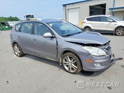 Czwarte zdjęcie samochodu z boku: 2011 HYUNDAI ELANTRA TOURING SE VIN:KMHDC8AE0BU097614 - miniatura