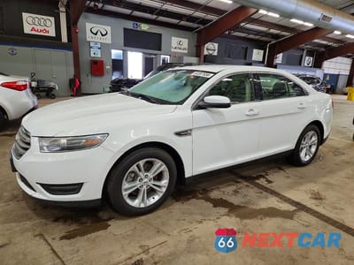 2015 FORD TAURUS SEL 1FAHP2H83FG129067 - główne zdjęcie licytacji z USA - miniatura