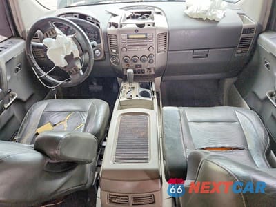 Zdjęcie 8 z 13 samochodu: 2004 NISSAN ARMADA SE VIN:5N1AA08B94N736284 - miniatura