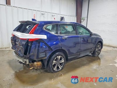 Trzecie zdjęcie samochodu z tyłu: 2018 HONDA CR-V LX VIN:2HKRW6H31JH211803 - miniatura