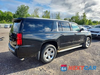 Trzecie zdjęcie samochodu z tyłu: 2015 CHEVROLET SUBURBAN K1500 LTZ VIN:1GNSKKKC4FR123012 - miniatura