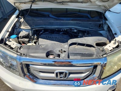 Zdjęcie 12 z 13 samochodu: 2011 HONDA PILOT EX VIN:5FNYF3H40BB033689 - miniatura