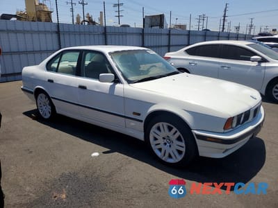 Czwarte zdjęcie samochodu z boku: 1995 BMW 525 I VIN:WBAHD5323SGB37770 - miniatura