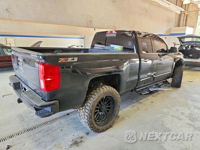 Trzecie zdjęcie samochodu z tyłu: 2017 CHEVROLET SILVERADO K1500 LTZ VIN:1GCVKSEJ6HZ105016 - miniatura