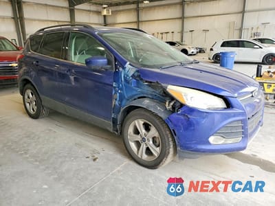 Czwarte zdjęcie samochodu z boku: 2014 FORD ESCAPE SE VIN:1FMCU0GX0EUD80098 - miniatura