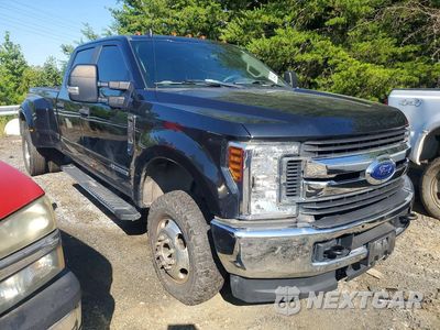 Czwarte zdjęcie samochodu z boku: 2019 FORD F350 SUPER DUTY VIN:1FT8W3DT7KEG67192 - miniatura