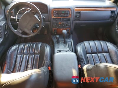 Zdjęcie 8 z 13 samochodu: 1999 JEEP GRAND CHEROKEE LIMITED VIN:1J4GW68N0XC527880 - miniatura