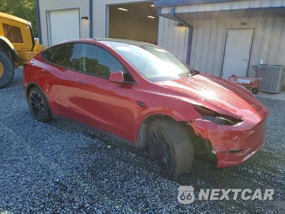 Czwarte zdjęcie samochodu z boku: 2023 TESLA MODEL Y VIN:7SAYGDEE7PA052182 - miniatura