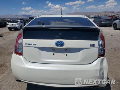 Zdjęcie 6 z 12 samochodu: 2014 TOYOTA PRIUS TWO VIN:JTDKN3DU8E1856723 - miniatura